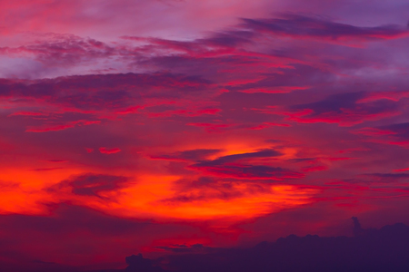 Nature background. Red sky at night and clouds. Beautiful and colorful sunset or sunrise time....