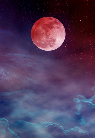Red moon or blood moon with many stars and clouds. Beautiful night landscape with full moon on colorful sky. Serenity nature background. The moon taken with my camera.の写真素材