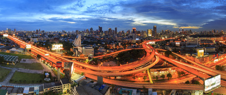 Bangkok city at twilight and main traffic high way, office building, panorama pictureの写真素材