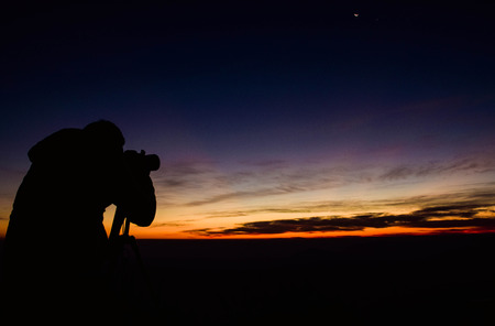 He is trying to capture the momentの写真素材