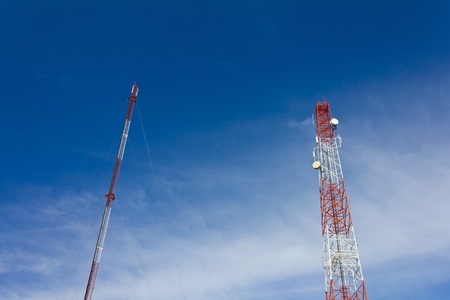 Antennas transmit and receive signals via satellite to use telecommuting.の写真素材