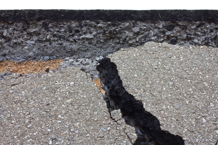 Side along the asphalt road collapsed because of erosion.のeditorial素材