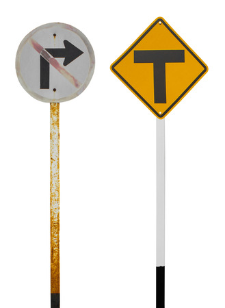 Isolates of old traffic sign prohibiting a turn, and a new junction ahead の写真素材