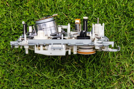 Mechanism of video tapes were discarded as trash laying on the grass の写真素材