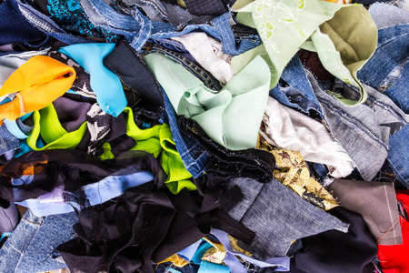 Background pile of scrap fabrics  Derived from sewing repairs の写真素材