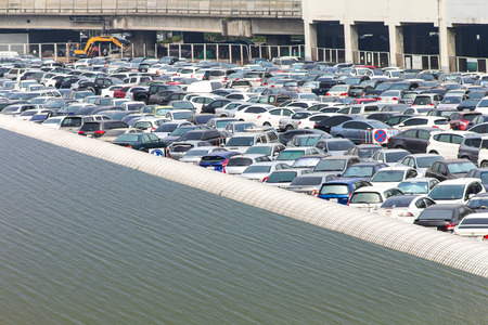 Parking a car lot where water will flood the roof cover.のeditorial素材
