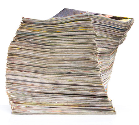 Isolates of spine journal publications stacked pile of twisted spiral layers.