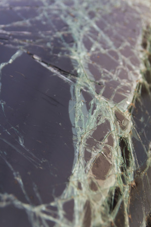 Close up background noise of the windshield is cracked accidental damage.の写真素材