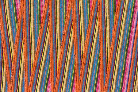 Background scrap piece of fabric pattern Thailand, which overlays a row of zigzag beautifully.の写真素材