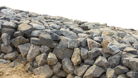 Isolates background pile stones, which packed a stack to barrage the sand on the beach.の写真素材