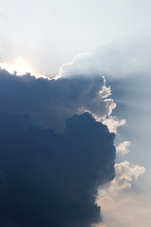 Background backlit clouds which obscured the sun during the day beautiful and frightening.の写真素材