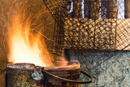 Close Blazing sparks from the stove in the kitchen of rural Thailand.の写真素材