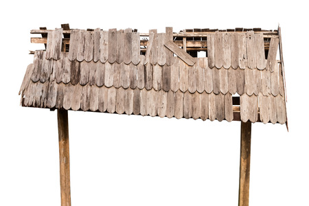 Close-up image of the old wooden roof of the entrance sign, which decayed.の写真素材