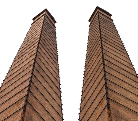 Isolate low view from the bottom of the old mill brick chimney, long rectangular shape high elongated.の写真素材