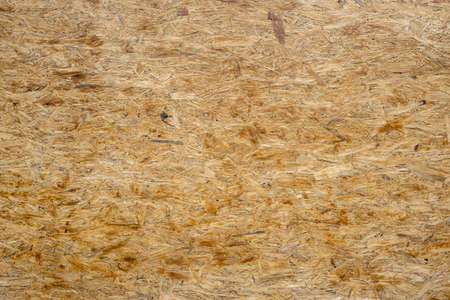 Background, dirty old plywood wall texture, which has been left in the sun for a long time, is...