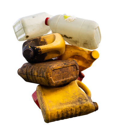 Close-up of old isolates of plastic gallon buckets that are tied together and hung together for reuse are common in rural Thai agriculture.の写真素材