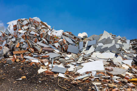 A view of the rubble, fragments of concrete, bricks and tiles piled up like hills from demolition...