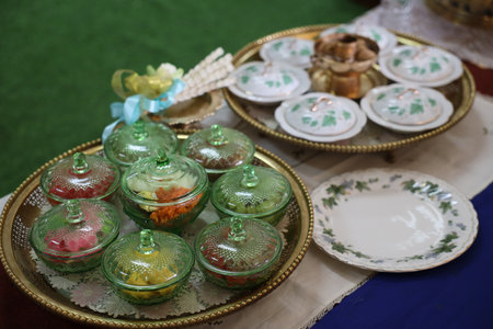 Bowls and plates on the table in a wedding ceremony.