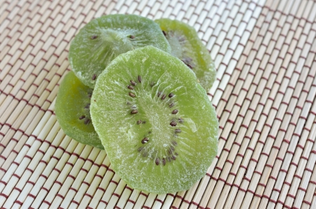 Dried kiwi on wood backgroundの写真素材