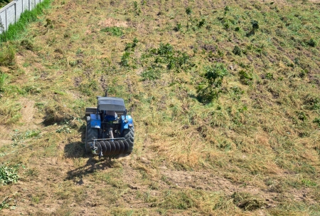 Tractor plowing the fields