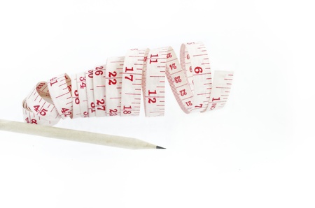 tape measuring with pencil isolated on a white backgroundの写真素材