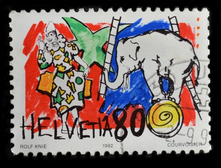 SWITZERLAND - CIRCA 1992   stamp printed by Switzerland, shows Clown and elephant, circa 1992のeditorial素材