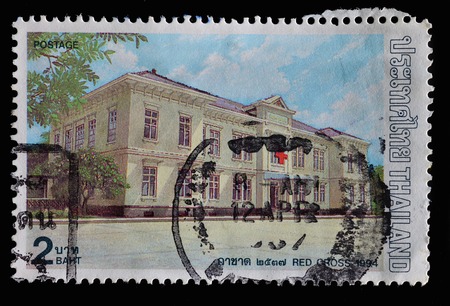 THAILAND - CIRCA 1994 : A stamp printed in Thailand shows Thailand red cross building, circa 1994のeditorial素材