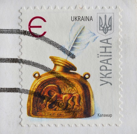 UKRAINE - CIRCA 2007 : postage stamp printed in Ukraine shows a quill and an ink, circa 2007のeditorial素材