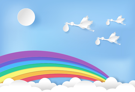 Paper art of stork flying with baby and rainbow on blue sky paper cut style illustrationのイラスト素材