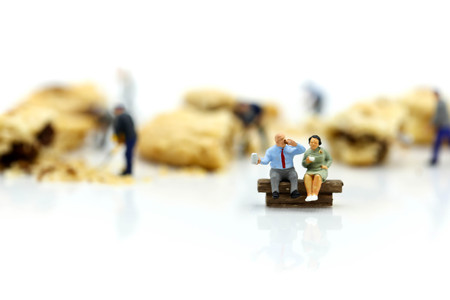 Miniature people : children and student  with cookies,play and education concept.