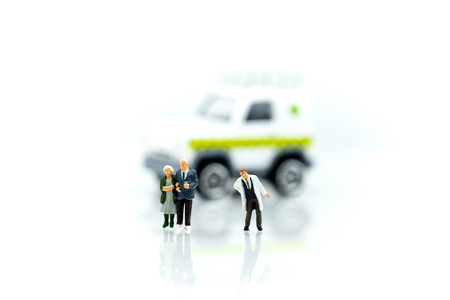Miniature people : oldman and Doctor with Ambulance emergency background,healthcare concept.の写真素材