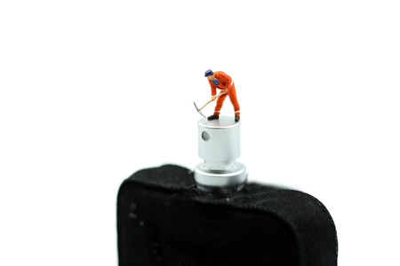Miniature people : Worker with a perfume.の写真素材