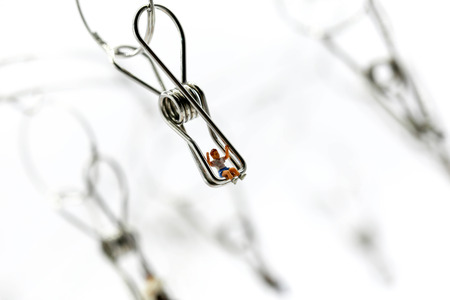 Miniature people : Joyful swinging on a swing,Fun and happiness concept.の写真素材
