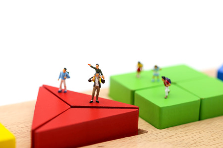 Miniature people : children with wooden block toy, Education concept.