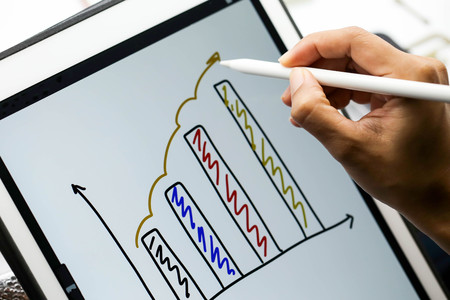 Businessman writing touch pad on wording Business.の写真素材