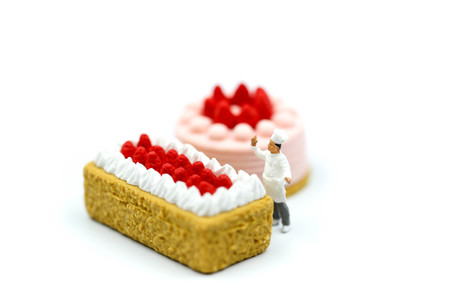 Miniature people : Chef with  sweet desserts.の写真素材