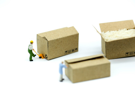 Miniature people : Business team with worker construction background.