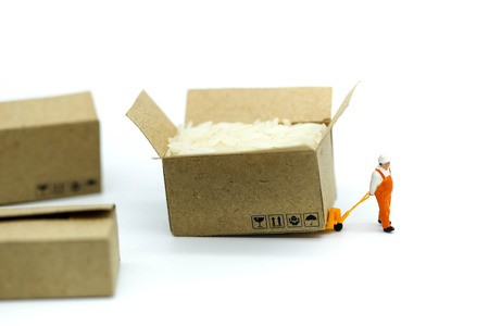 Miniature people : Business team with worker construction background.