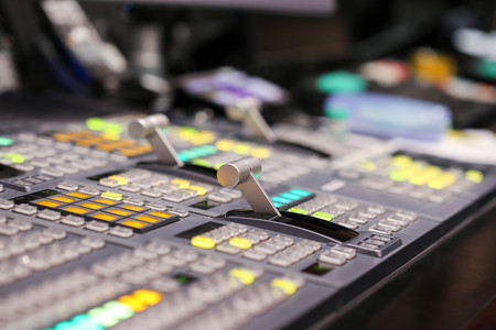 Switcher buttons in studio TV station, Audio and Video Production Switcher of Television Broadcast.の写真素材