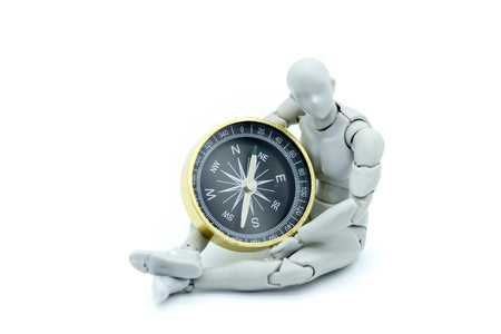 Model robot with compass,business and travel concept.の写真素材