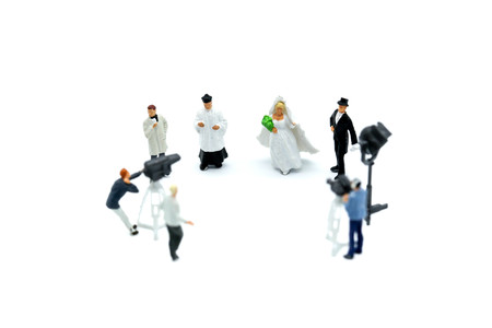 Miniature people : cameraman ,Videographer at work shooting on  couple of love will marry,production concept.の写真素材