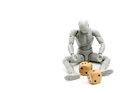 Model robot playing a dice.の写真素材