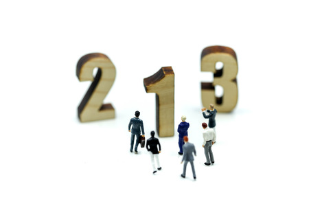 Miniature people : Businessman and team with wooden number of 1,2,3 , to be the first,business competition concept.の写真素材