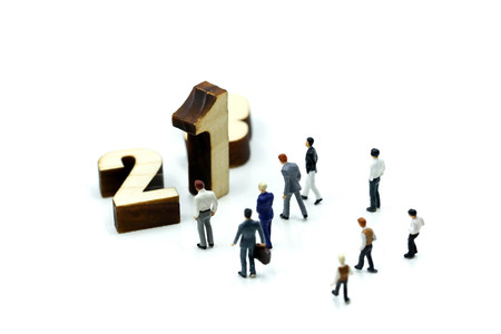 Miniature people : Businessman and team with wooden number of 1,2,3 , to be the first,business competition concept.の写真素材