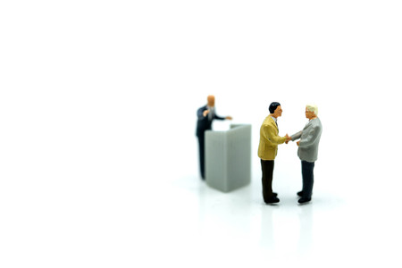 Miniature people : Businessman Leads Meeting Conference Discussion Corporate Concept.の写真素材