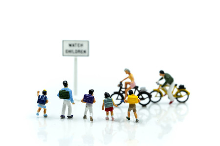 Miniature people : student or children crossing road on way to school,Back to school concept.の写真素材