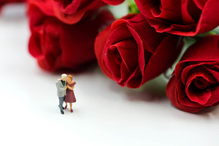 Miniature people : Couple of love with red rose,Lover or valentine's day concept.の写真素材