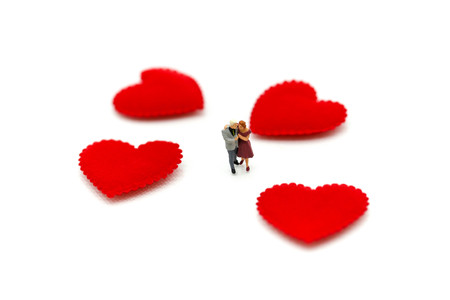 Miniature people : Couple of love with red heart,sweet lover concept.