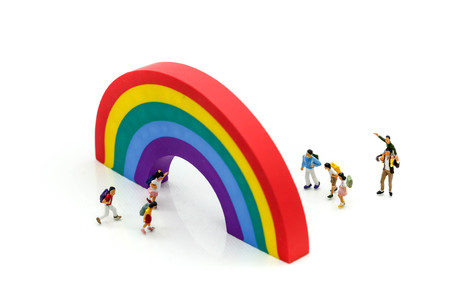 Miniature people : children and student playground in city park with rainbow background,Education,Play and learn concept.の写真素材