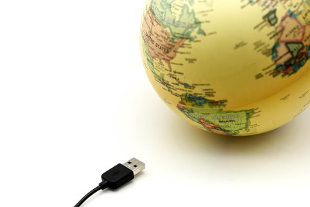 USB Cables with globe world map,connected to the globe  Concept.の写真素材